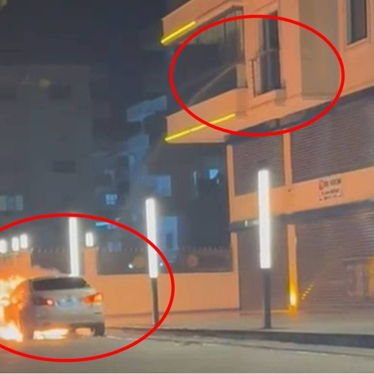 Yanan otomobile balkondan su döktü