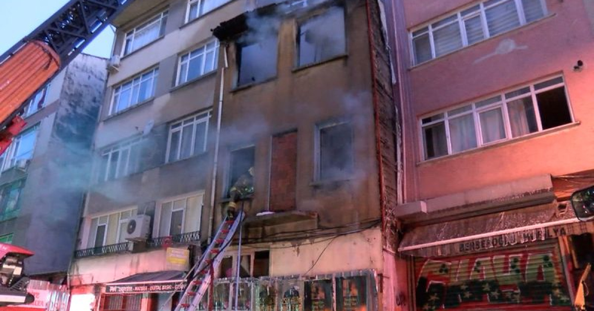 Yangında binadan atladı!